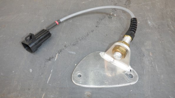 Hall cell sensor for ignition trigger.  mounts to block-off plate